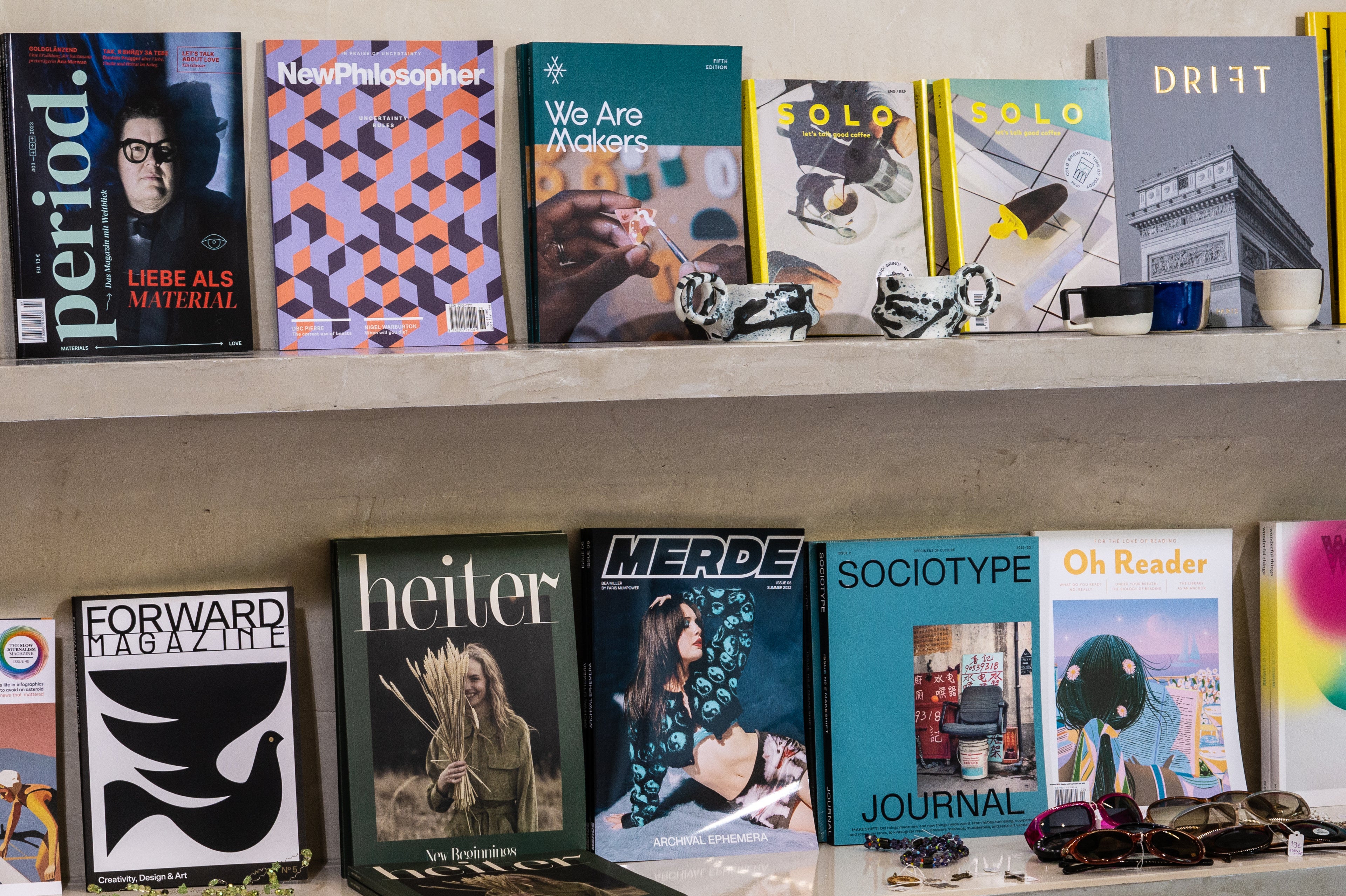 A shelf with magazines